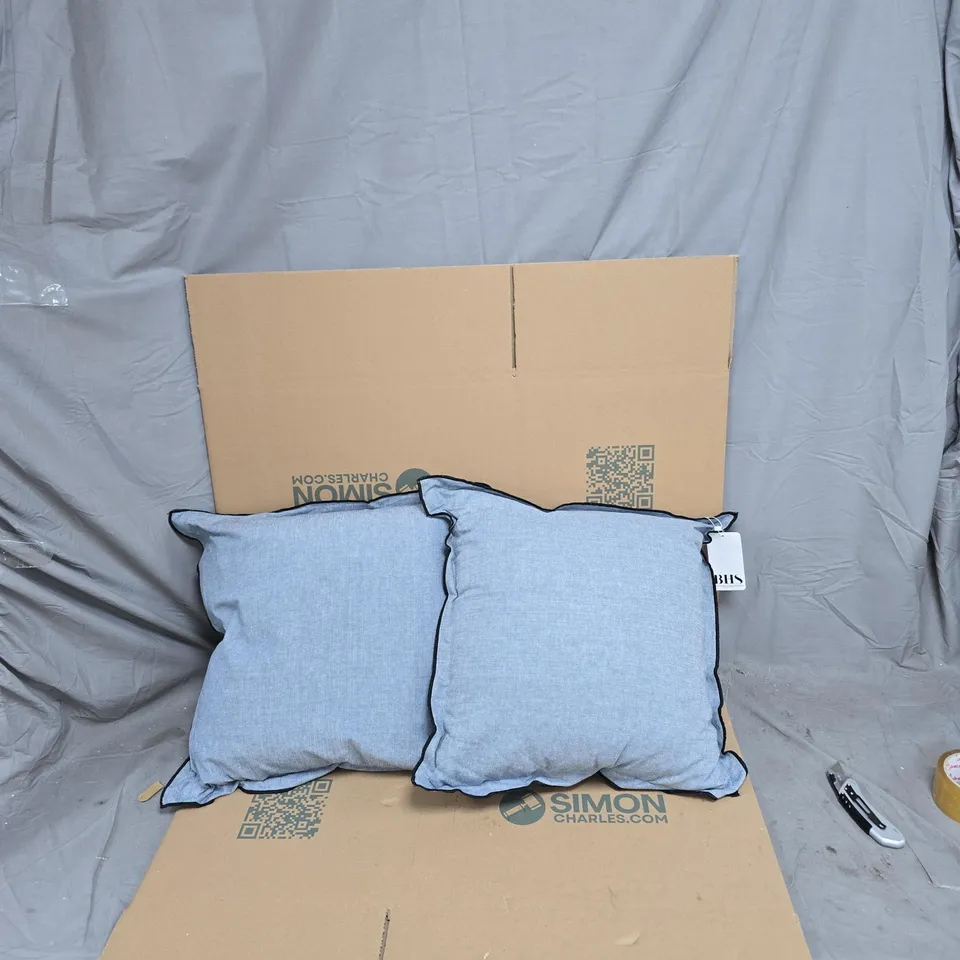 TWO LIGHT-BLUE CUSHIONS WITH NAVY PIPING – BHS LABEL (SET OF 2)