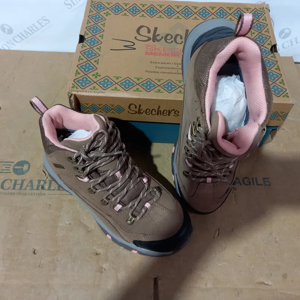 BOXED PAIR OF SKECHERS WALKING BOOTS- SIZE 6