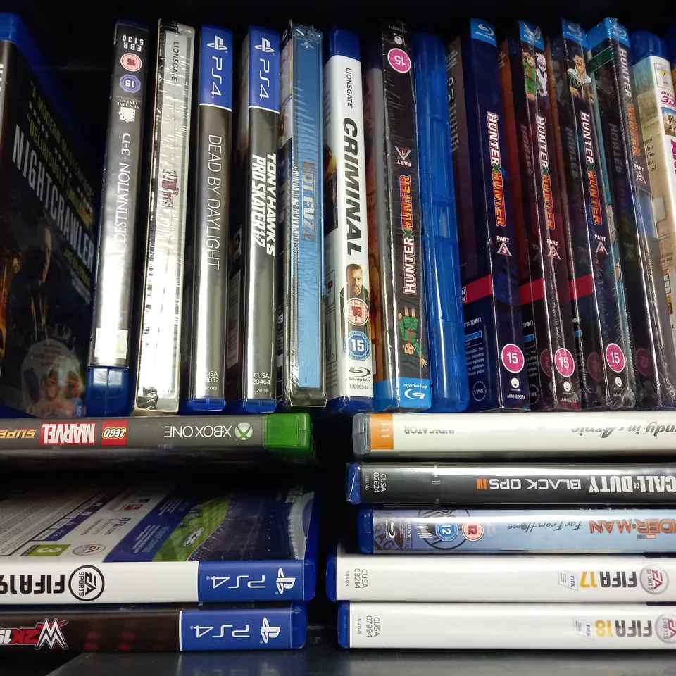 BOX OF APPROX 20 ASSORTED DVDS & VIDEO GAMES TO INCLUDE - PS5 FIFA23 - XBOX ONE LEGO MARVEL SUPER HEROS - PS4 CALL OF FUTY BLACK OPPS III ECT 