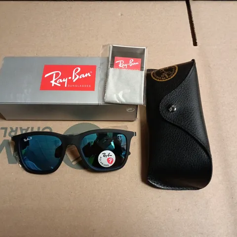 BOXED PAIR OF RAY BAN POLARIZED GLASSES WITH BLACK FRAMES