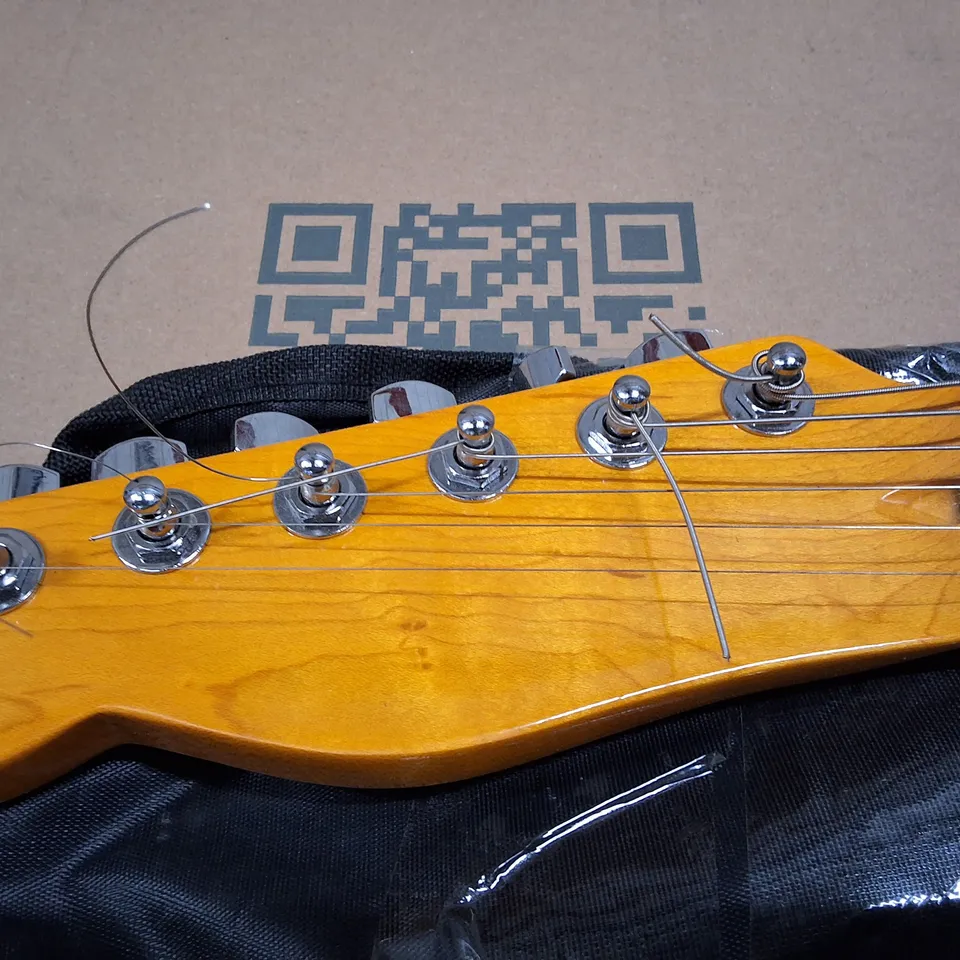 LEFT-HANDED BLUE ELECTRIC GUITAR WITH MAPLE NECK AND TREMOLO BRIDGE (INCLUDES CHORD BOOK)