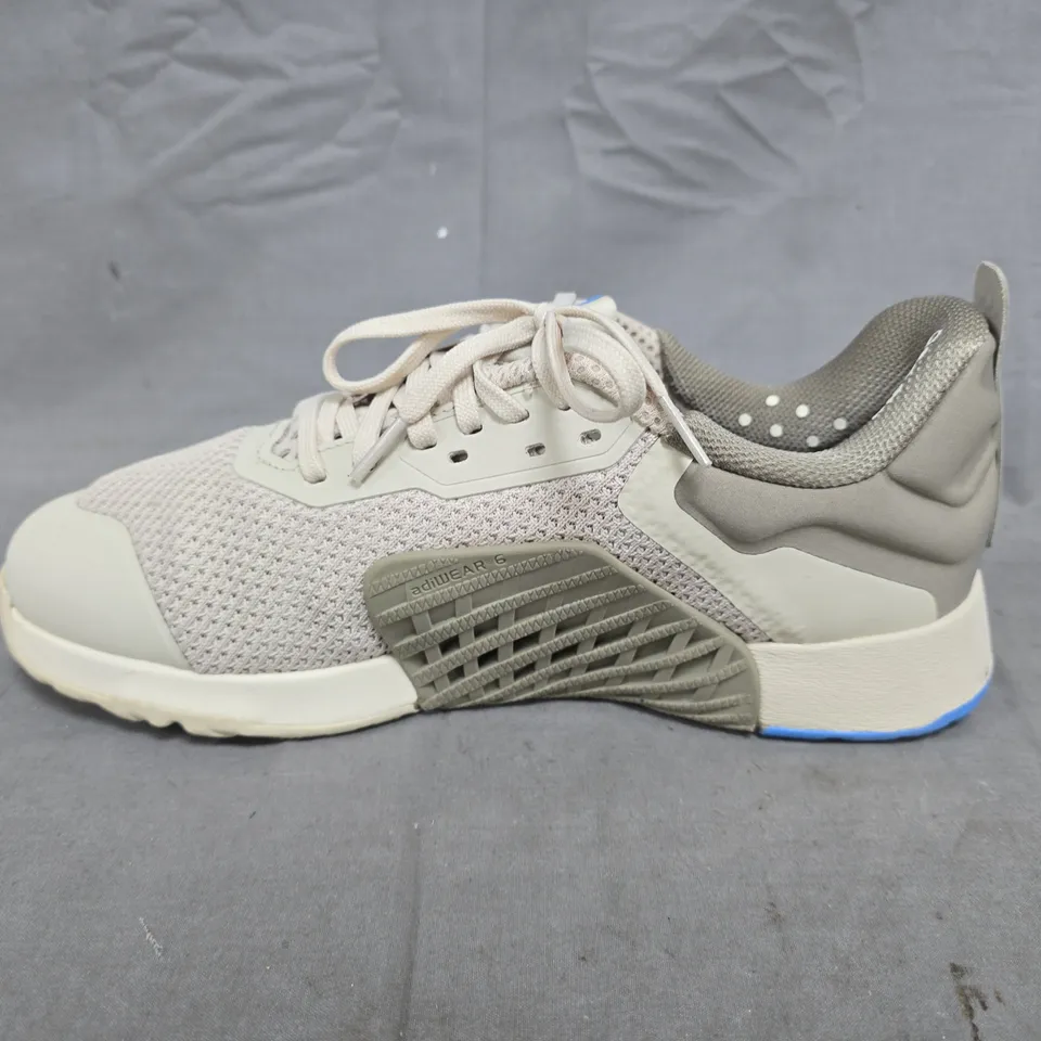 PAIR OF ADIDAS TRAXION TRAINERS NATURAL - UK 8