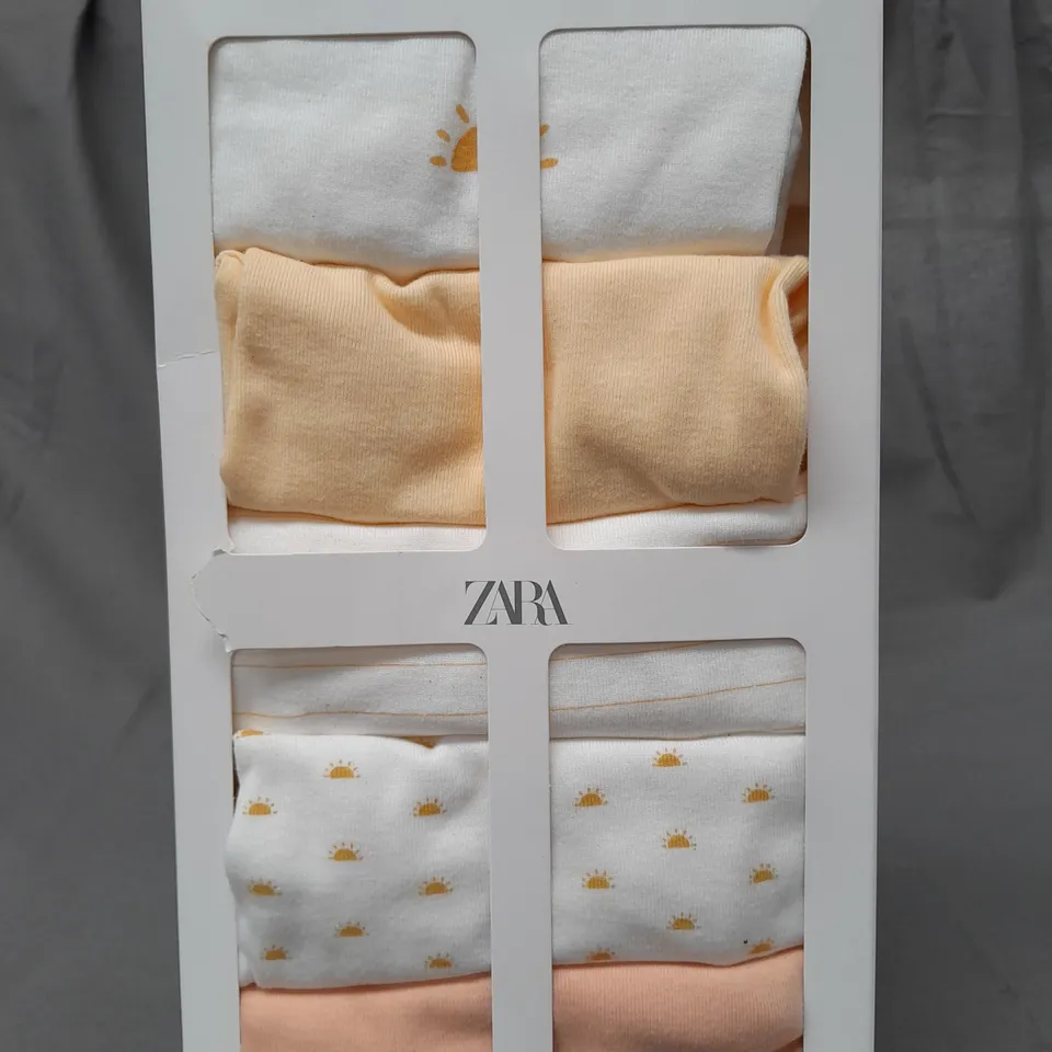 ZARA SET OF 5 BODYSUITS IN VARIOUS COLOURS SIZE 12-18 MONTHS