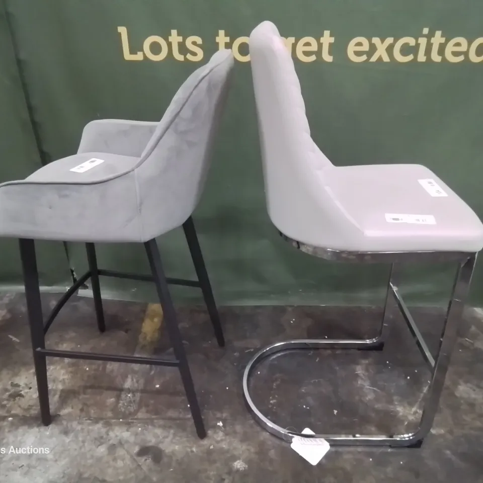 TWO DESIGNER UPHOLSTERED BAR STOOLS