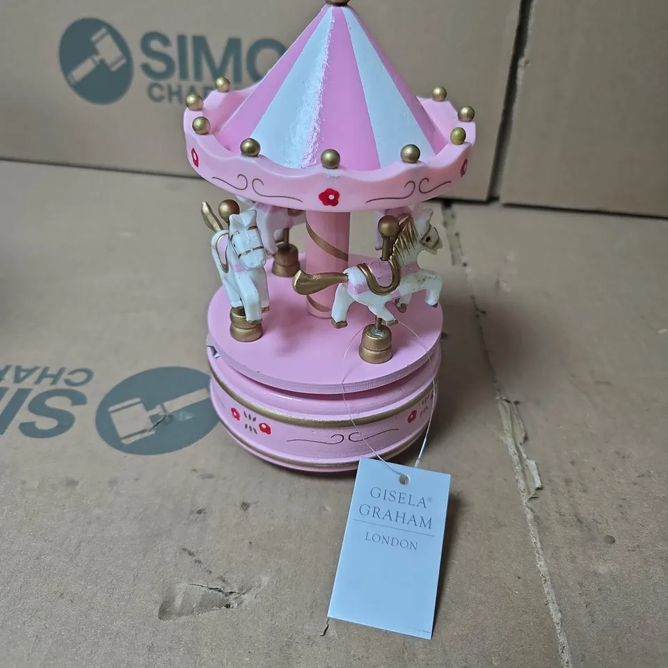 BOX OF APPROXIMATELY 15 GISELA GRAHAM MUSICAL MERRY-GO-ROUNDS PINK