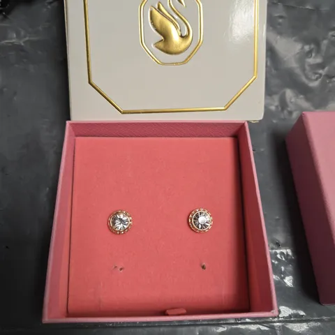 SWAROVSKI GOLD-TONE STUD EARRINGS WITH CLEAR STONES – BOXED