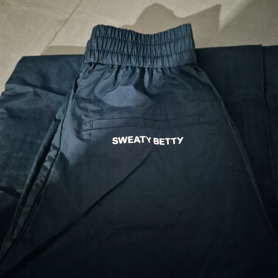 SWEATY BETTY SHELL WIDE LEG PANTS