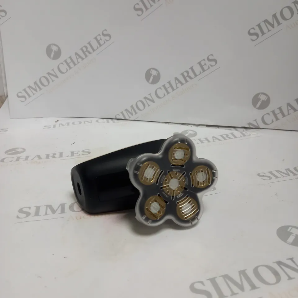 BOXED HANDHELD ELECTRIC SHAVER. 