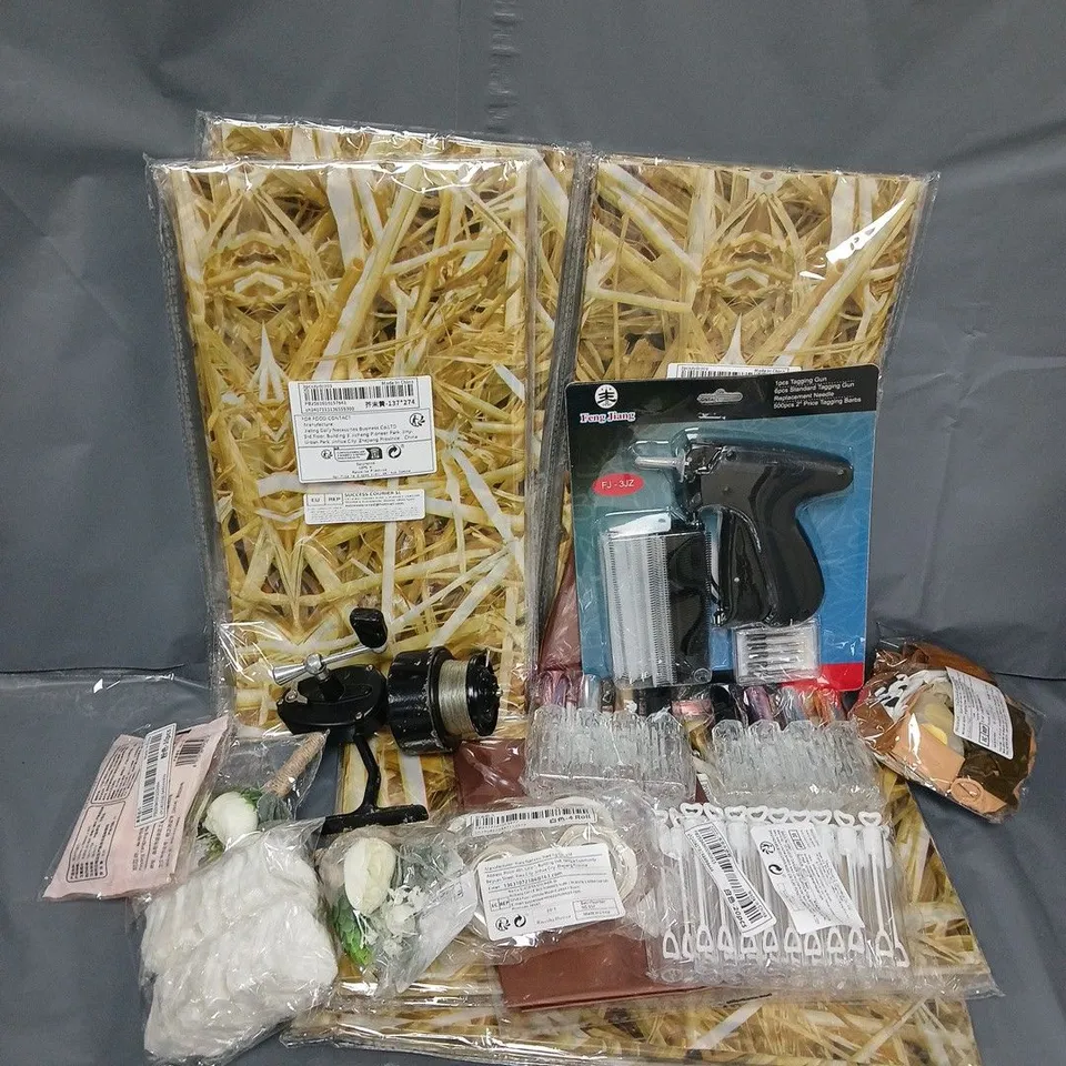 APPROXIMATELY 12 ASSORTED HOUSEHOLD ITEMS TO INCLUDE TAGGING GUN, PERFUME SPRAY BOTTLE, BALLOONS, ETC
