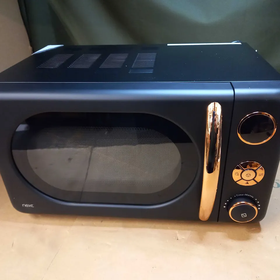 BLACK AND COPPER MICROWAVE 