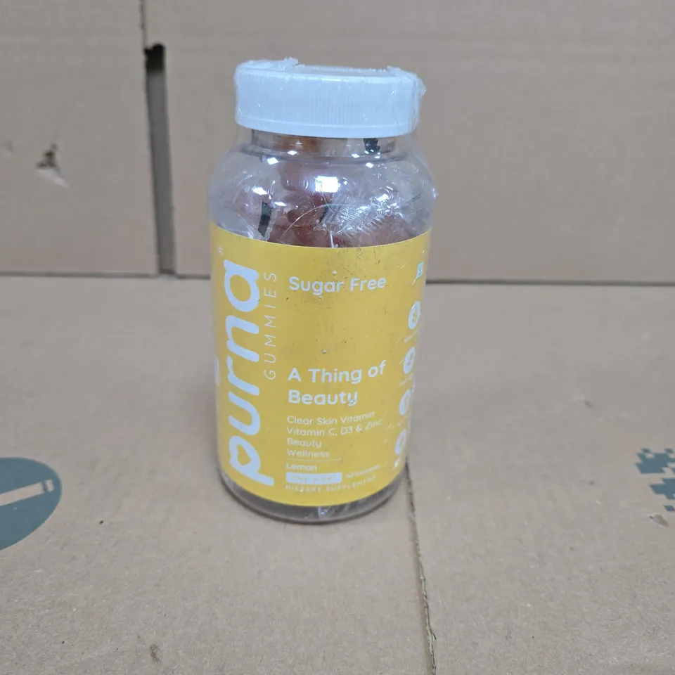 BOX OF APPROXIMATELY 24 TUBS OF PURNA GUMMIES VITAMIN C DIETARY SUPPLEMENT LEMON FLAVOUR FOR ADULT AND KIDS 60 GUMMIES PER TUB