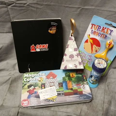 APPROXIMATELY 12 ASSORTED TOYS & GAMES PRODUCTS TO INCLUDE GAME OF BRICKS, TURKEY SHOOTER, MAGNETIC CUBES, ETC