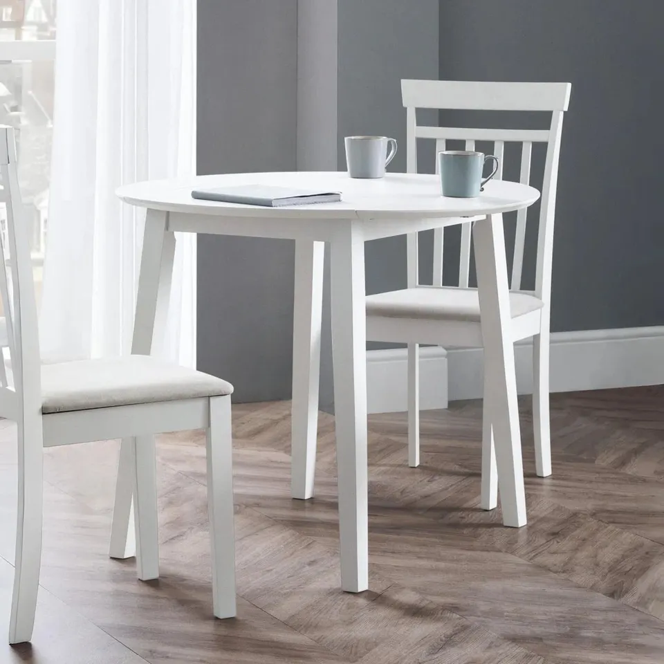 BOXED EXETER EXTENDABLE ROUND SOLID WOOD BASE DINING TABLE 