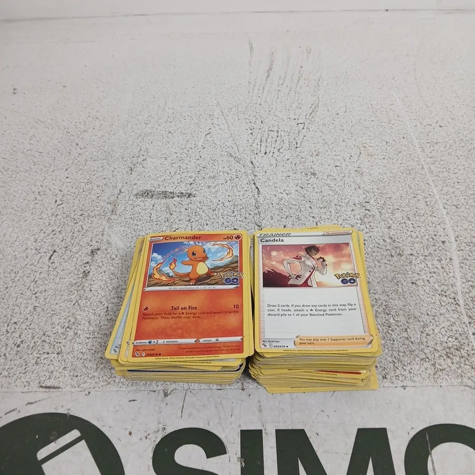 POKÉMON TRADING CARDS – (LOOSE, 2 STACKS)