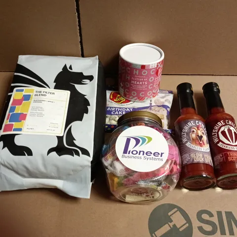 APPROXIMATELY 10 ASSORTED FOOD ITEMS TO INCLUDE SWEETS, HOT SAUCE AND COFFEE