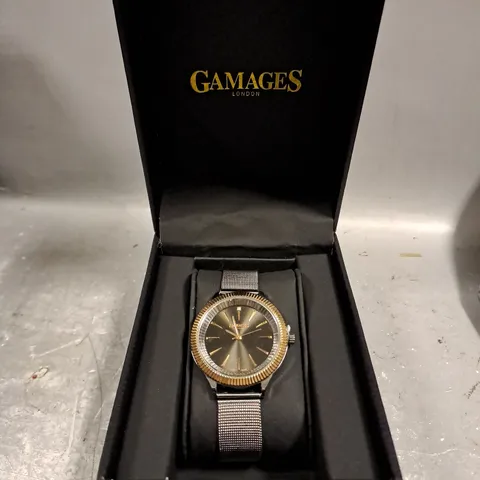 BOXED GAMAGES FLUTED DIAMOND BLACK DIAL WATCH