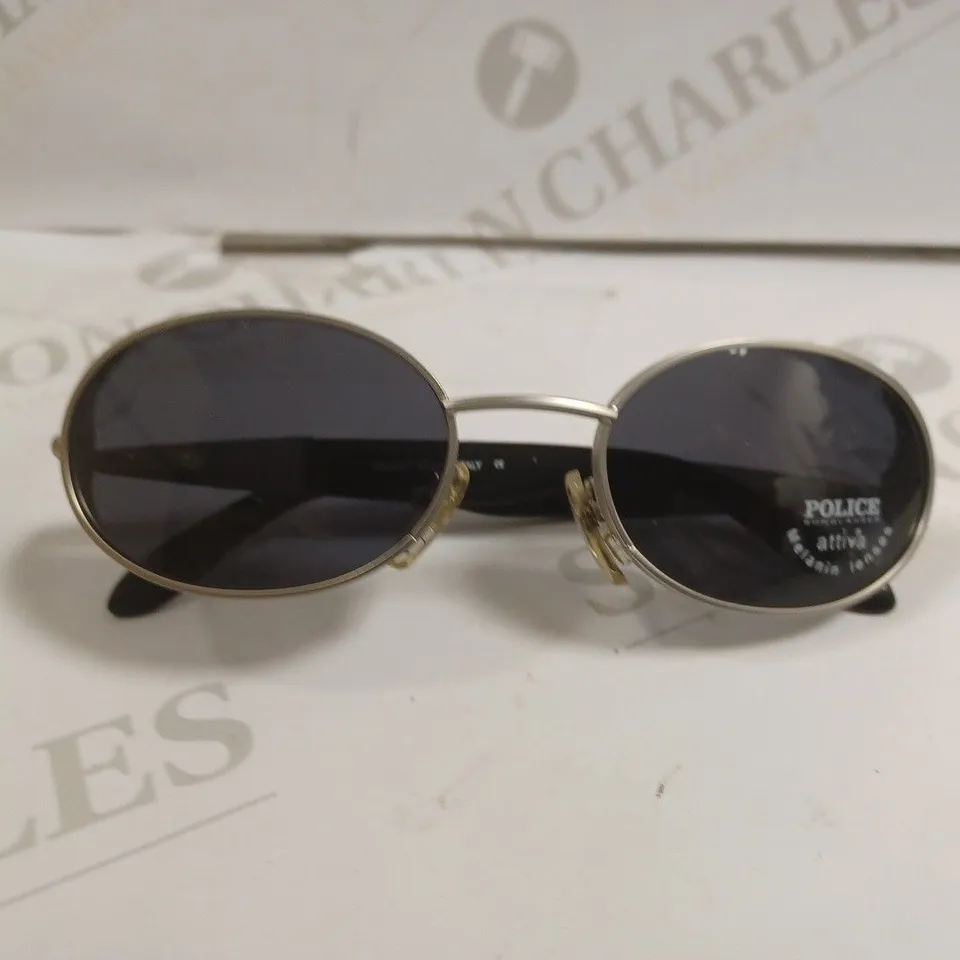 APPROXIMETLEY 10X 52404 / 0581 POLICE SUNGLASSES 