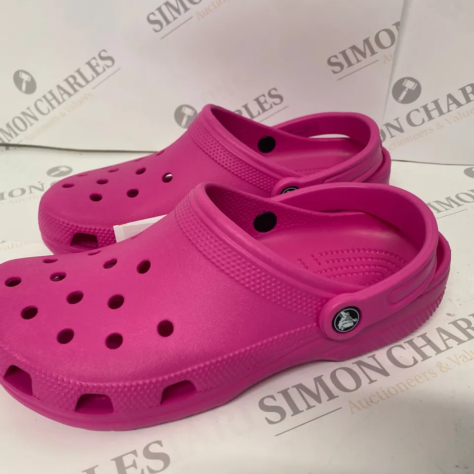 PAIR OF PINK CROCS SIZE M8 W10