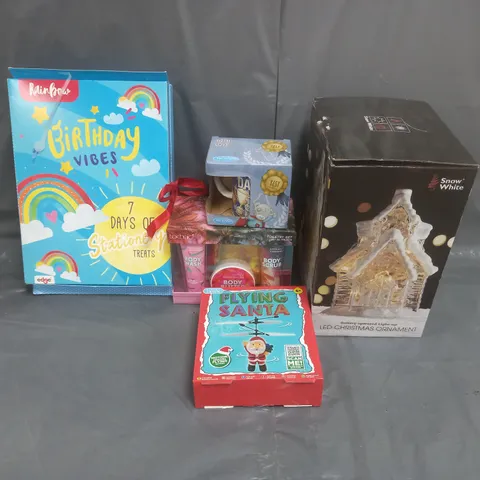 BOX OF ASSORTED ITEMS TO INCLUDE FLYING SANTA, LED CHRISTMAS ORNAMER AND MUGS