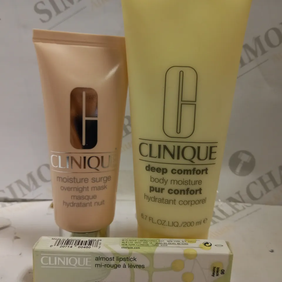 3 CLINIQUE ITEMS INCLUDING DEEP COMFORT BODY MOISTURE, MOISTURE SURGE OVERNIGHT MASK AND ALMOST LIPSTICK