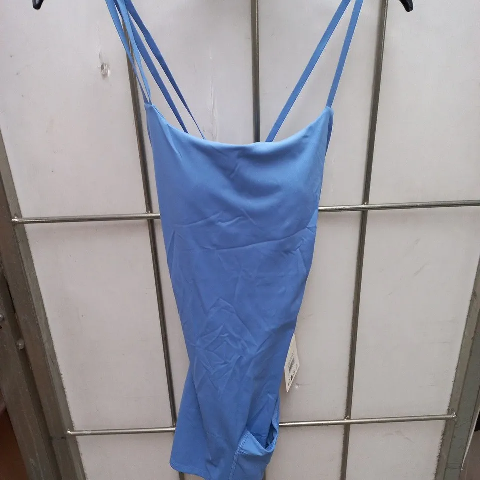 ADANOLA ULTIMATE LOW CROSS BACK ROMPER – BLOSSOM BLUE, SIZE M