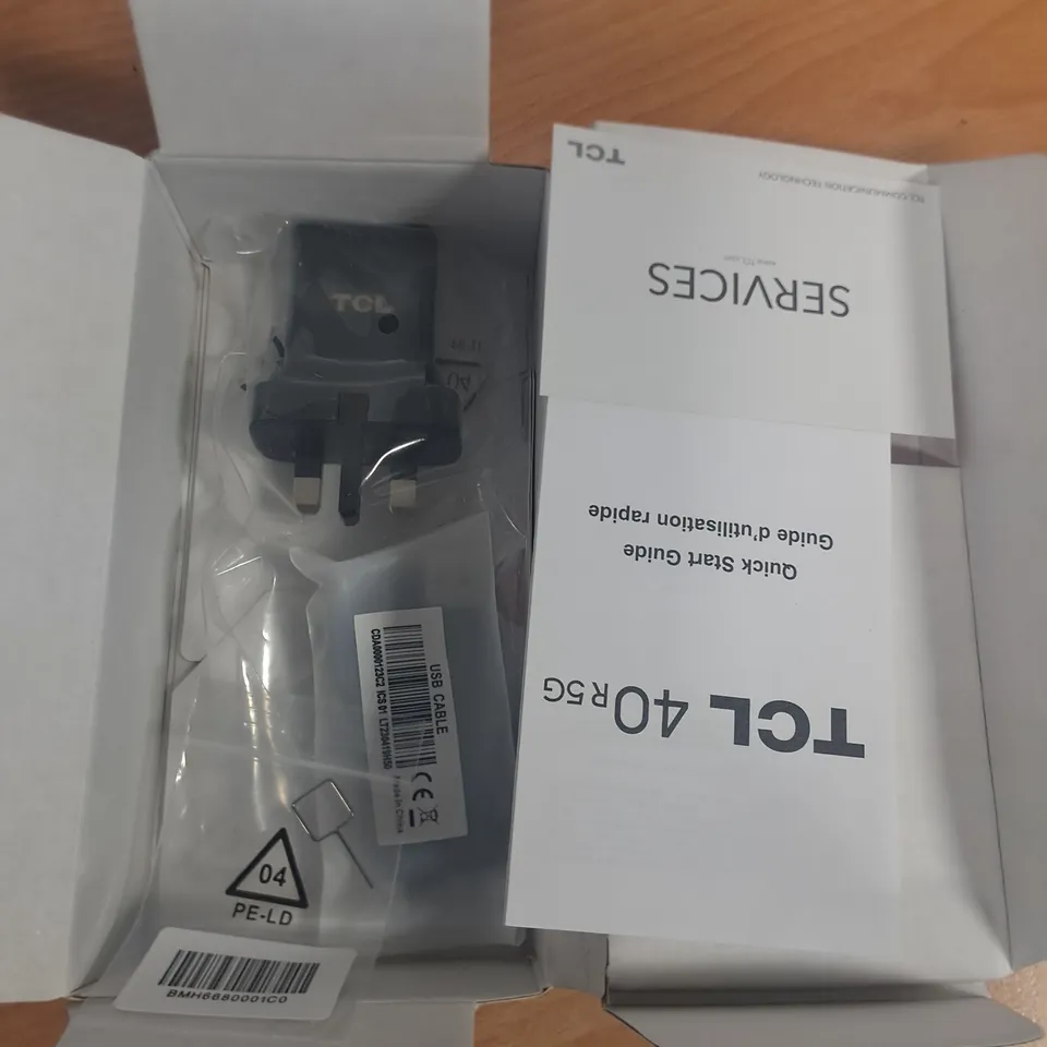 BOXED TCL 40 R5G 64GB IN STARLIGHT BLACK - T771K