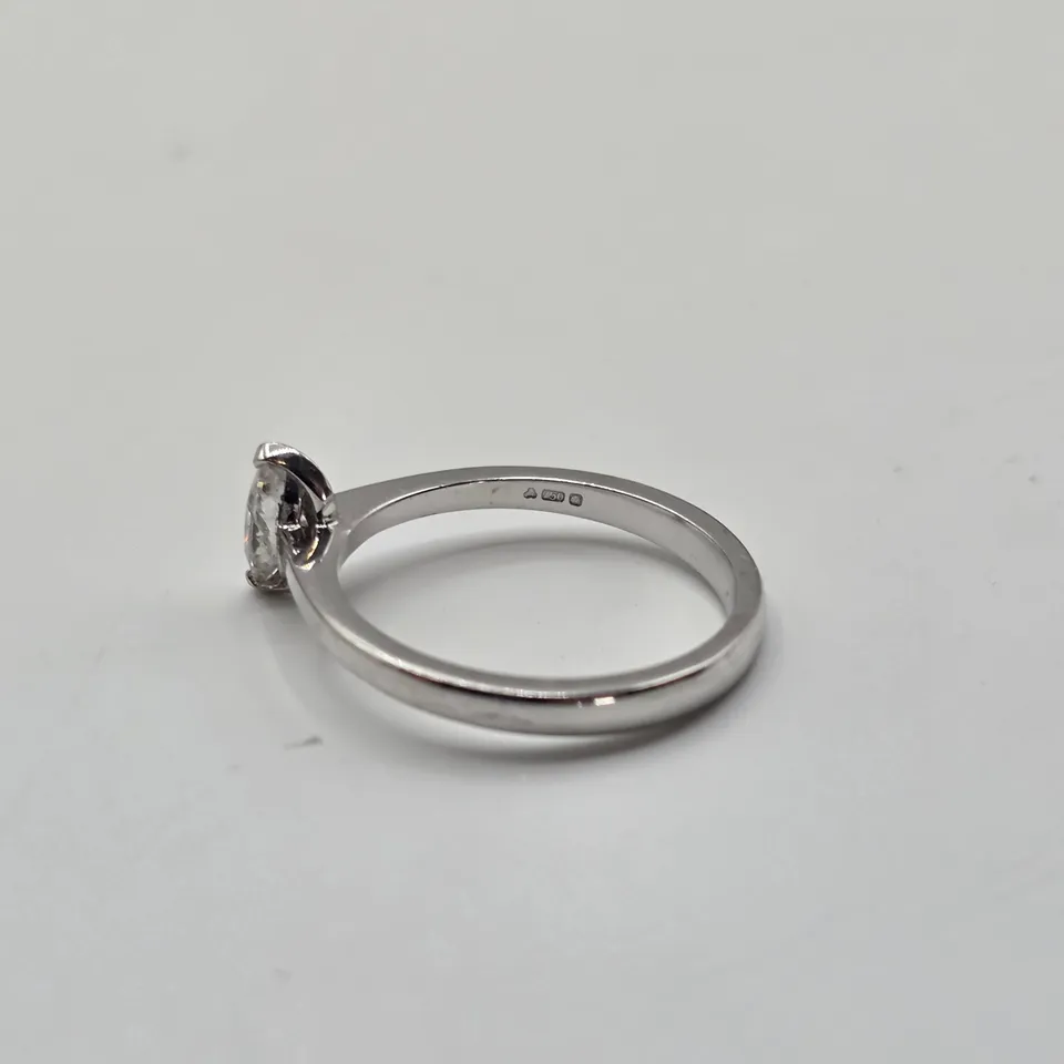18CT WHITE GOLD SOLITAIRE RING SET WITH A MARQUISE CUT NATURAL DIAMOND