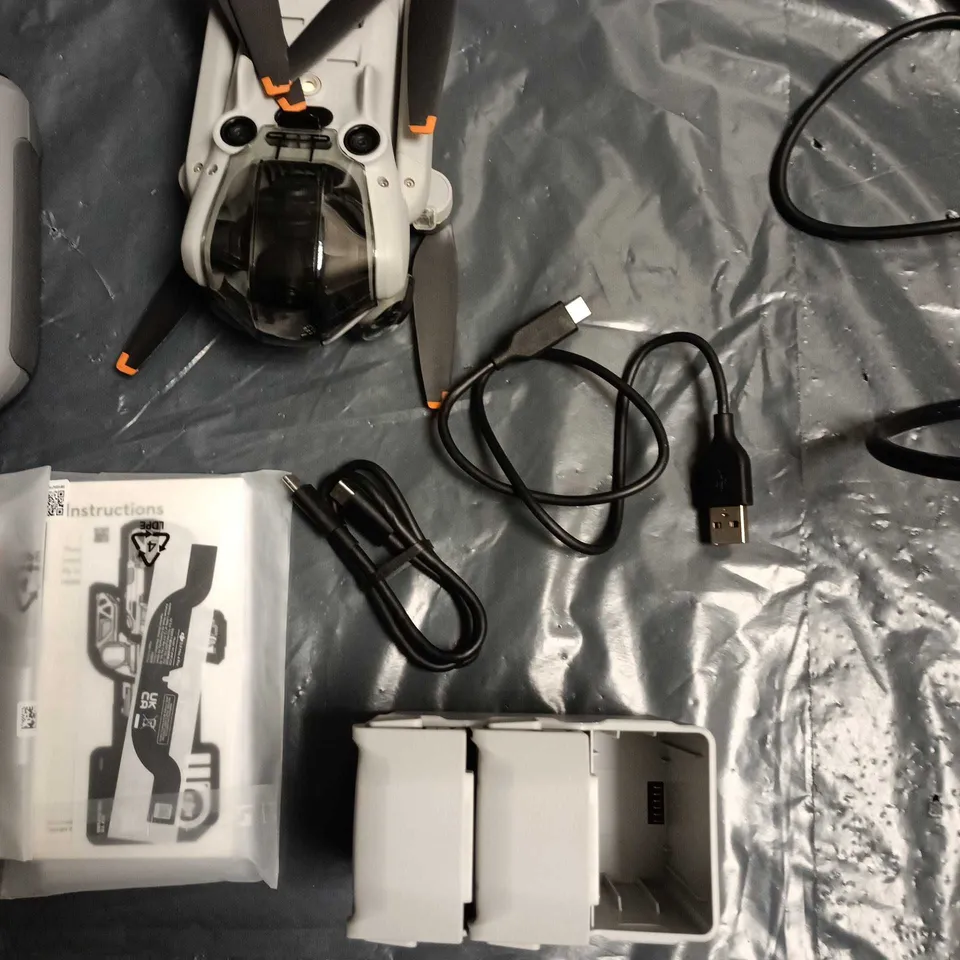 DJI Drone kit with integrated-screen controller, batteries & charger – carry case