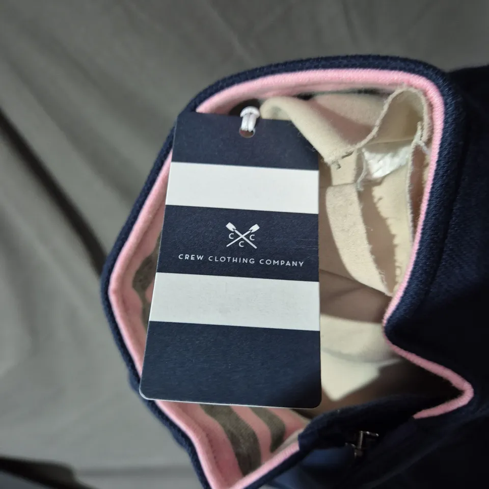 CREW CLOTHING COMPANY NAVY JACKET, SIZE S, PINK INTERIOR – LOGO CHEST