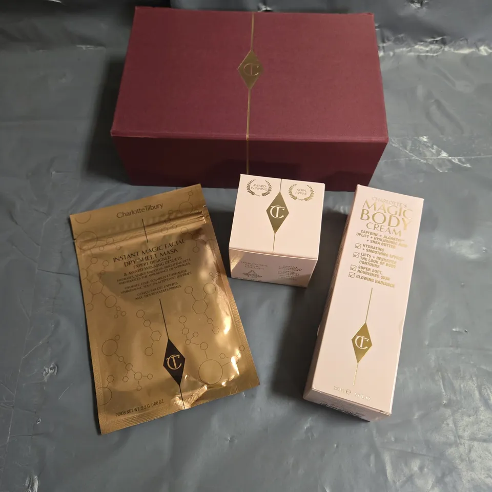 BOXED X3 ASSORTED CHARLOTTE TILBURY COSMETIC PRODUCTS TO INCLUDE - MAGIC CREAM - MAGIC BODY CREAM - INSTANT MAGIC FACIAL DRY SHEET MASK