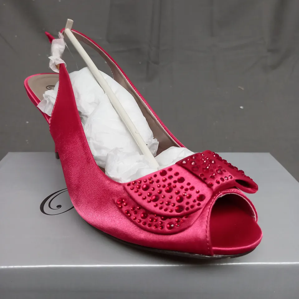 BOX OF 10 PAIRS OF FUCHSIA HIGH HEELED SHOES 