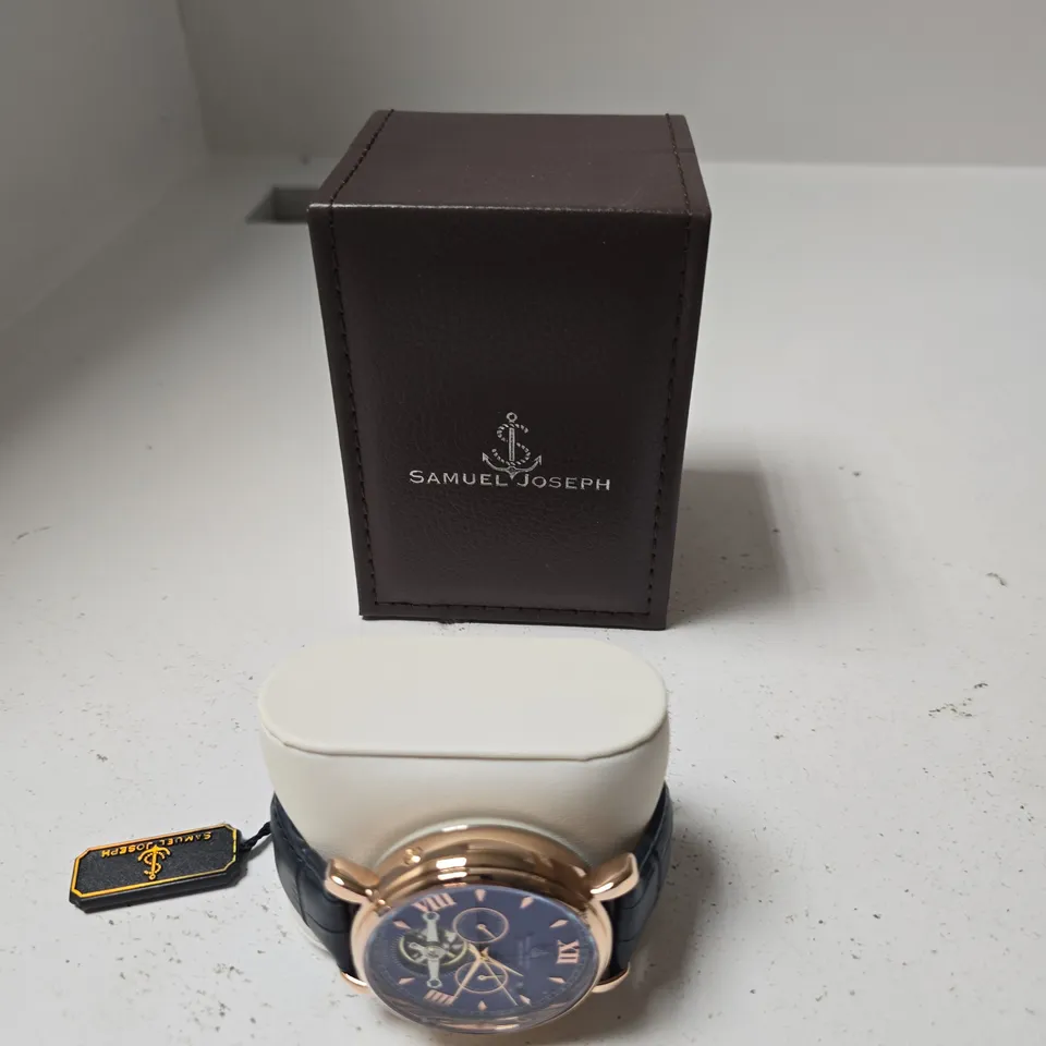 BOXED SAMUEL JOSEPH AUTOMATIC LIMITED EDITION ROSE GOLD TONE BLUE DIAL WATCH
