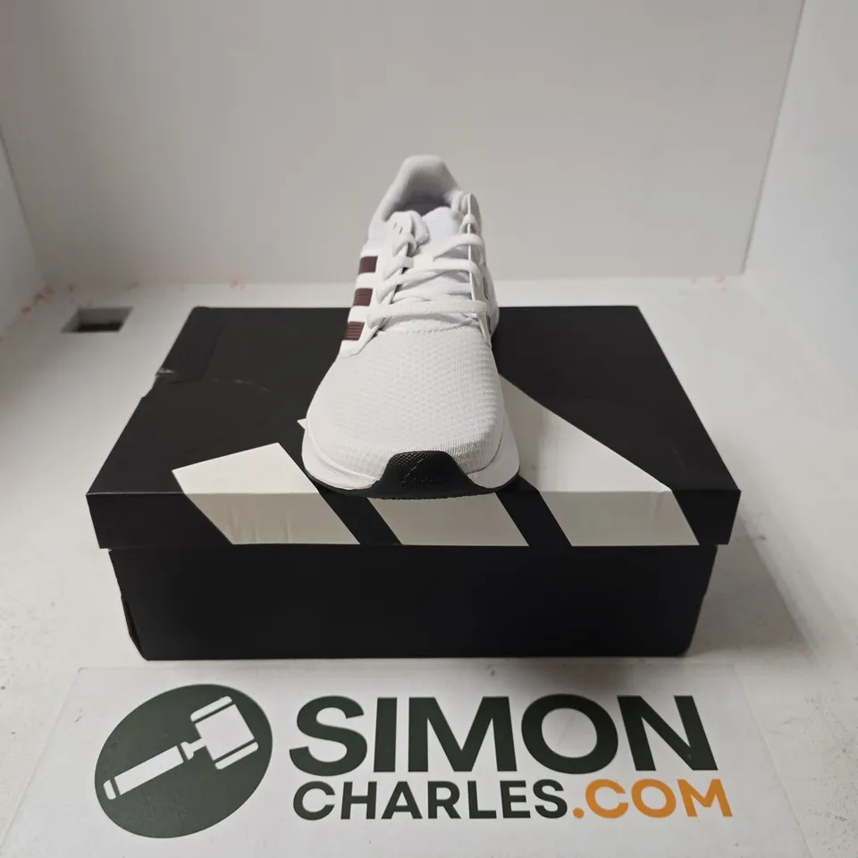 BOXED PAIR OF ADIDAS GALAXY 6 M TRAINERS IN WHITE - UK 9.5