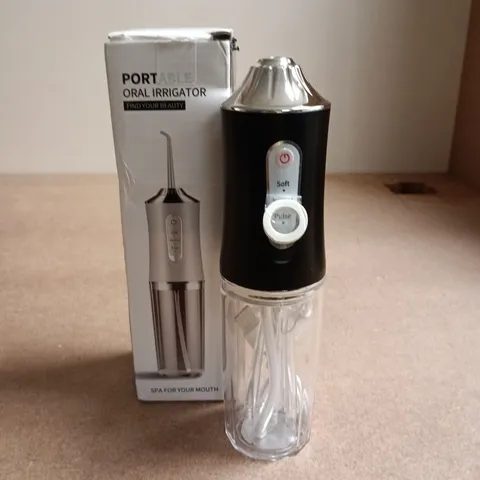 PORTABLE ORAL IRRIGATOR WITH RESERVOIR – BLACK & CLEAR