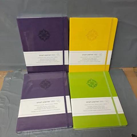 APPROXIMATELY 10 ASSORTED SMART PLANNERS PRO IN VARIOUS COLOURS TO INCLUDE YELLOW, GREEN, PURPLE