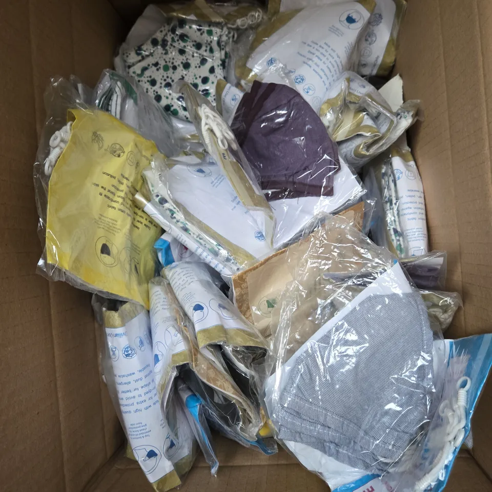 BOX OF APPROXIMATELY 50 ADJUSTABLE FABRIC FACE MASKS IN ASSORTED DESIGNS