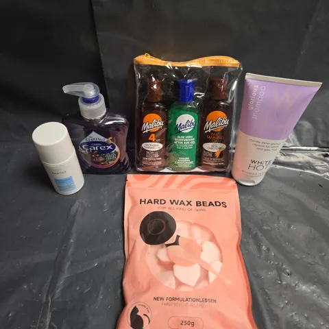 APPROXIMATEY 20 ASSORTED HEALTH AND BEAUTY PRODUCTS TO INCLUDE - CAREX HAND WASH - HARD WAX BEADS AND MALIBU TANNING SET