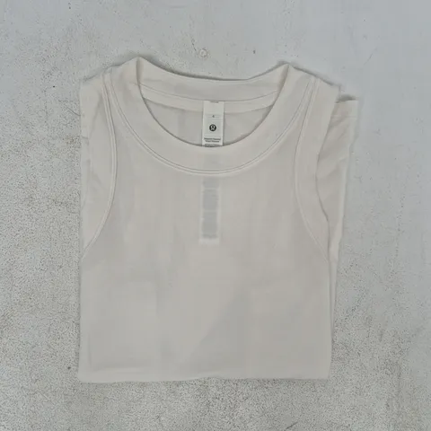 BAGGED LULULEMON JERSEY TRAINING TANK TOP IN WHITE SIZE 4