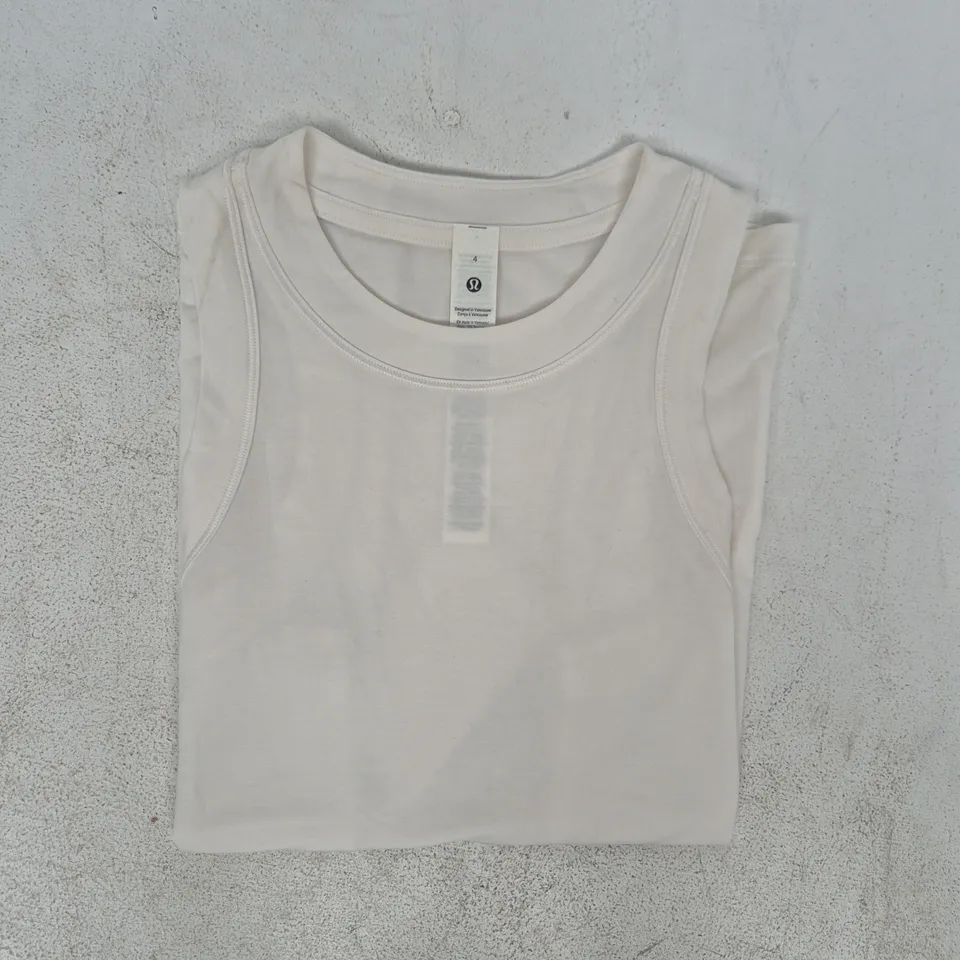 BAGGED LULULEMON JERSEY TRAINING TANK TOP IN WHITE SIZE 4