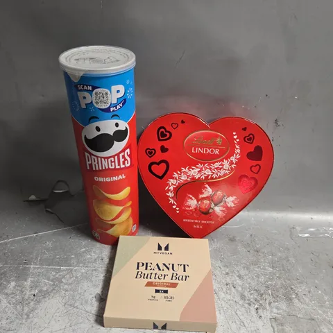 APPROXIMATELY 3 ASSORTED FOOD &DRINK ITEMS TO INCLUDE - PRINGLES, MY PROTEIN AND LINDOR