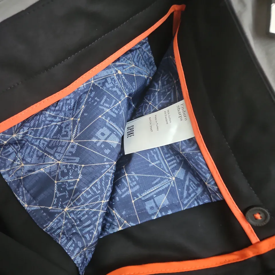 SPOKE ENDURO SHARPS JACKET – BLACK WITH ORANGE PIPING (MADE IN TURKEY)