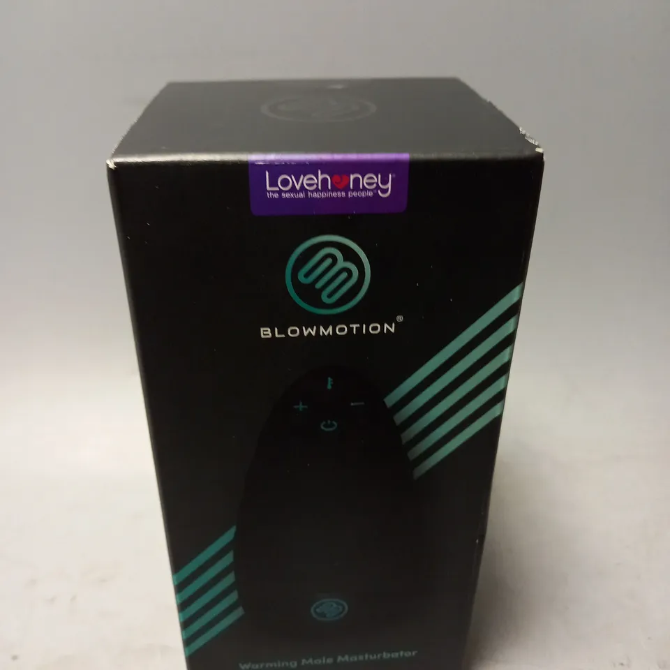 BOXED AND SEALED LOVEHONEY BLOWMOTION WARMING MALE MASTURBATOR