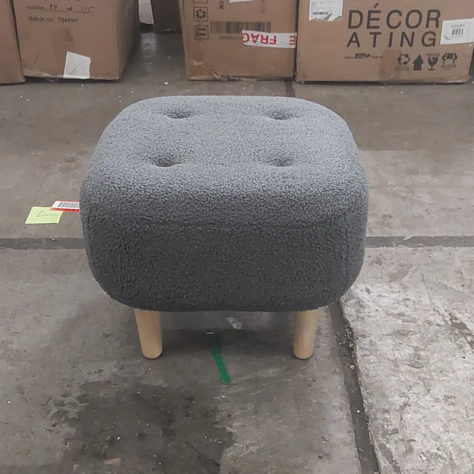 DESIGNER UPHOLSTERED POUFFE