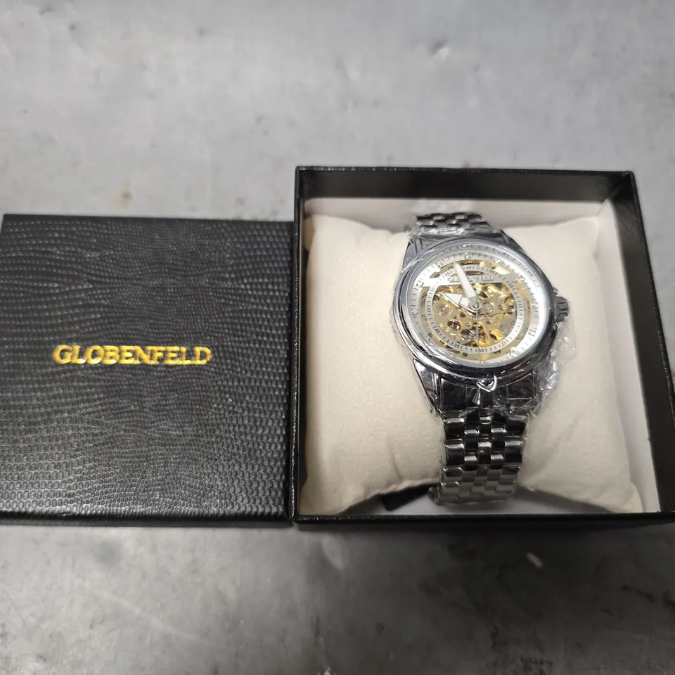 BOXED GLOBENFIELD EXHIBITION DIAL GENTS WATCH WITH SKELETON BACK CASE AND METAL STRAP