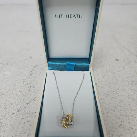 KIT HEATH NECKLACE – TWO-TONE RING PENDANT IN SILVER & GOLD