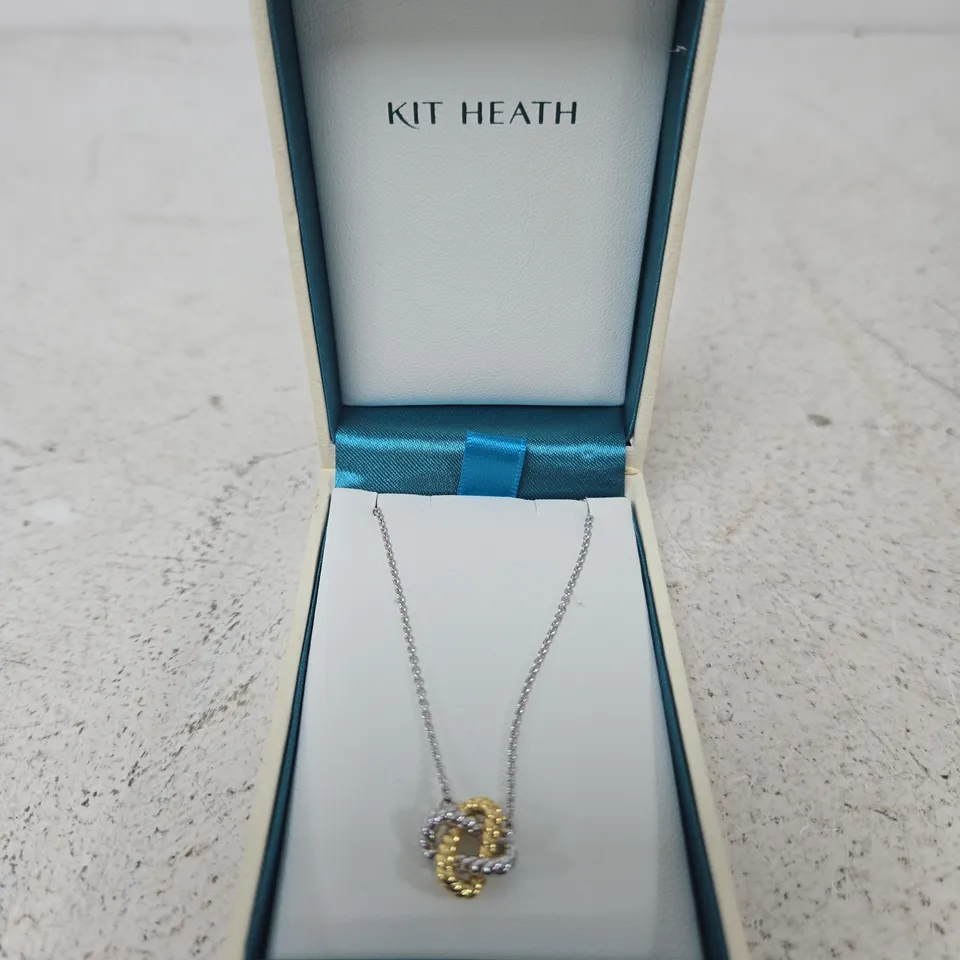 KIT HEATH NECKLACE – TWO-TONE RING PENDANT IN SILVER & GOLD
