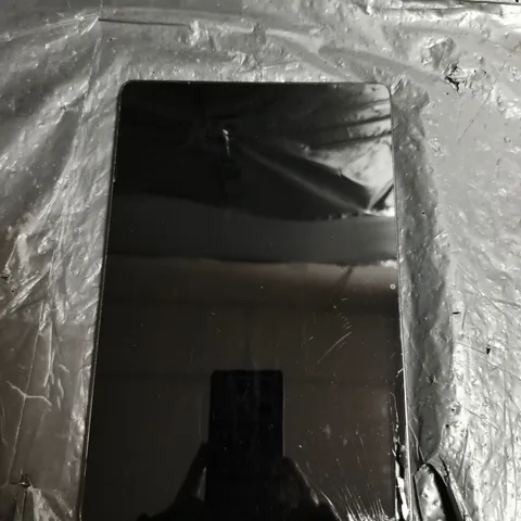 SAMSUNG TABLET – SILVER/GRAY, METAL BACK WITH REAR CAMERA TOP-RIGHT - MODEL UNSPECIFIED