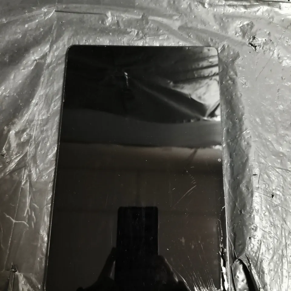 SAMSUNG TABLET – SILVER/GRAY, METAL BACK WITH REAR CAMERA TOP-RIGHT - MODEL UNSPECIFIED