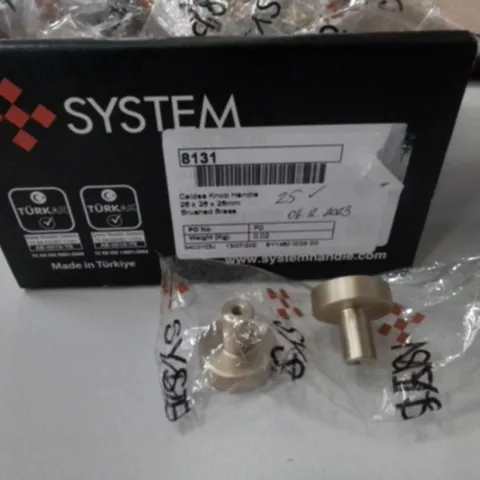 LOT OF APPROXIMATELY 25 SYSTEM CALDEA KNOBS HANDLES IN BRUSHED BRASS