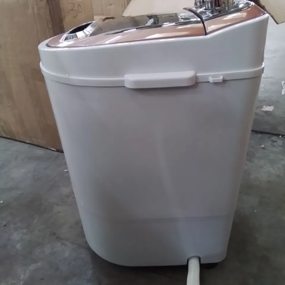 A BOXED COUNTER TOP MINI WASHING MACHINE 